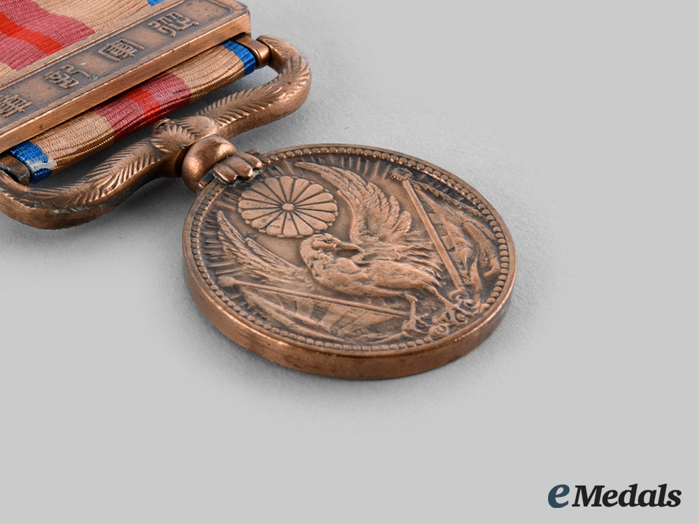 japan,_empire._a_china_incident_war_medal_with_case1937_ci19_4508_1_2_1