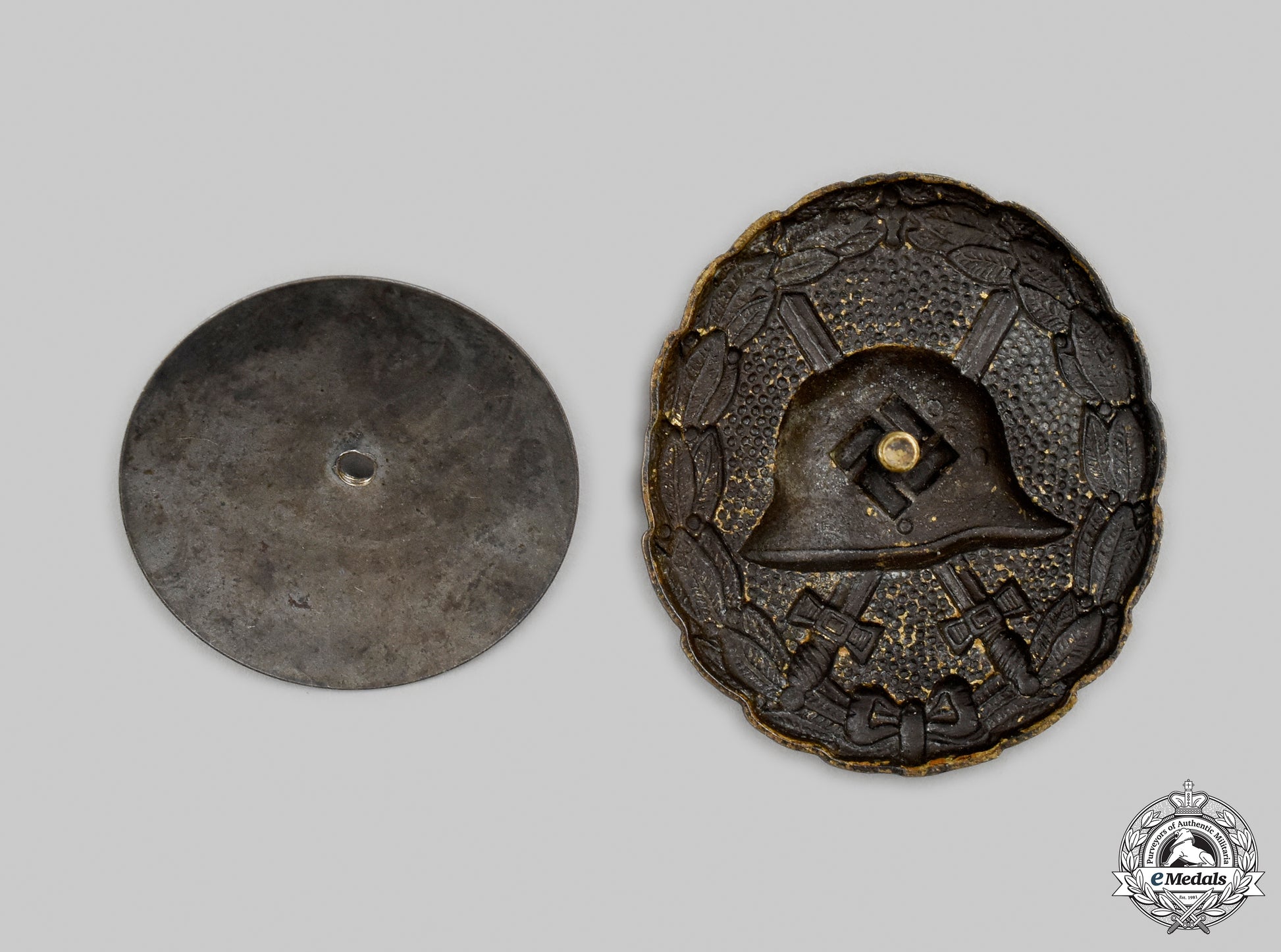 germany,_wehrmacht._a_rare_first_pattern_black_wound_badge,_screwback_variation_cic2021__mnc6892