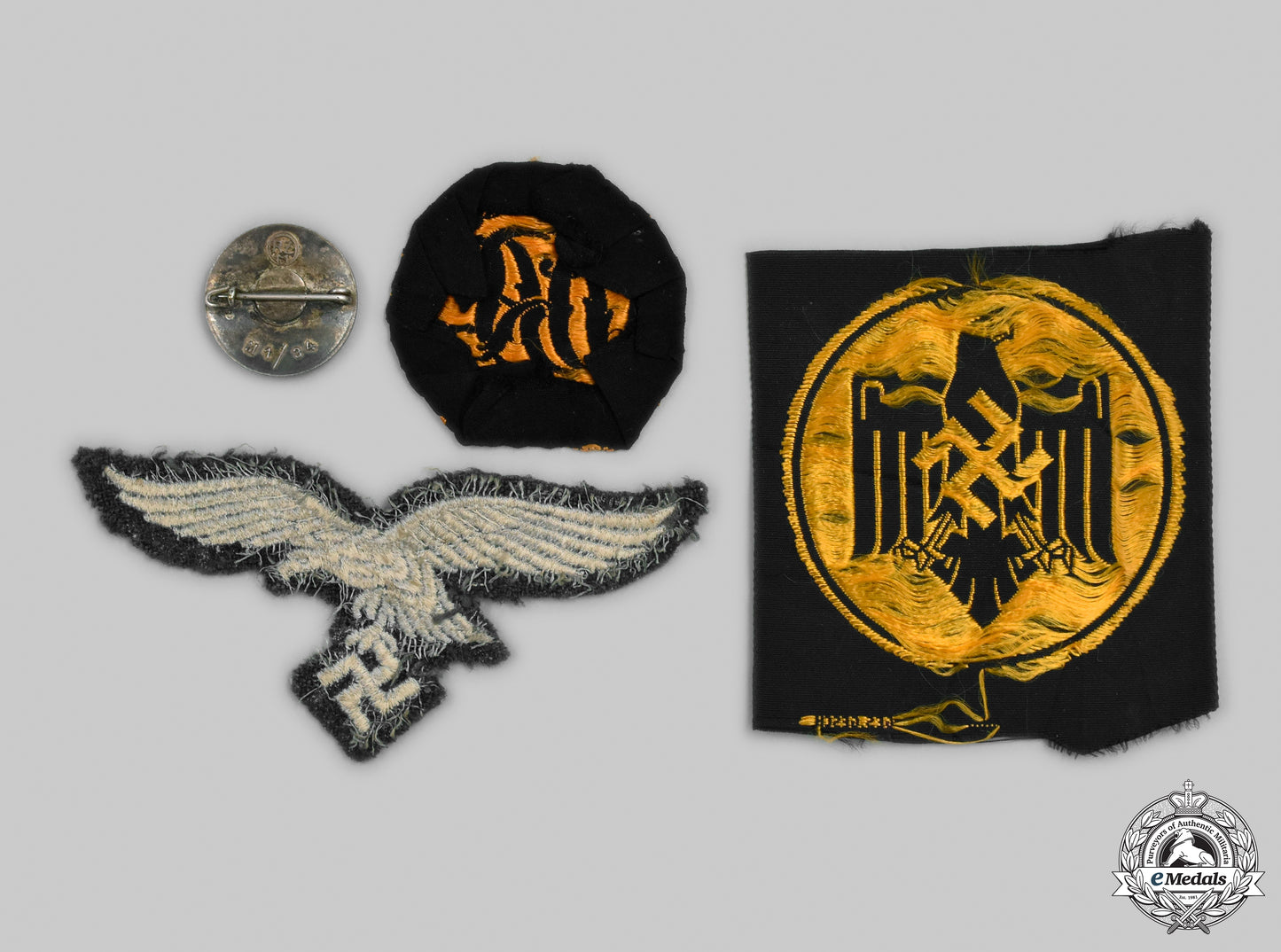 germany,_third_reich._a_mixed_lot_of_insignia_cic_2021_052_mnc6817