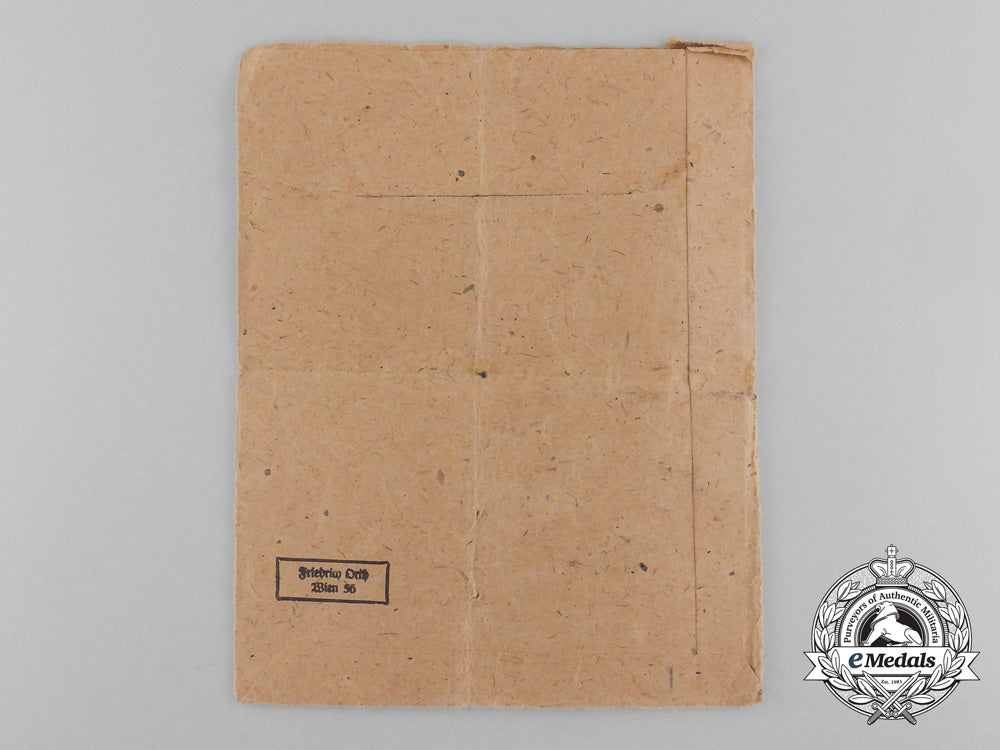a_second_class_war_merit_cross_with_swords_in_original_packet_of_issue_by_friedrich_orth_d_0223