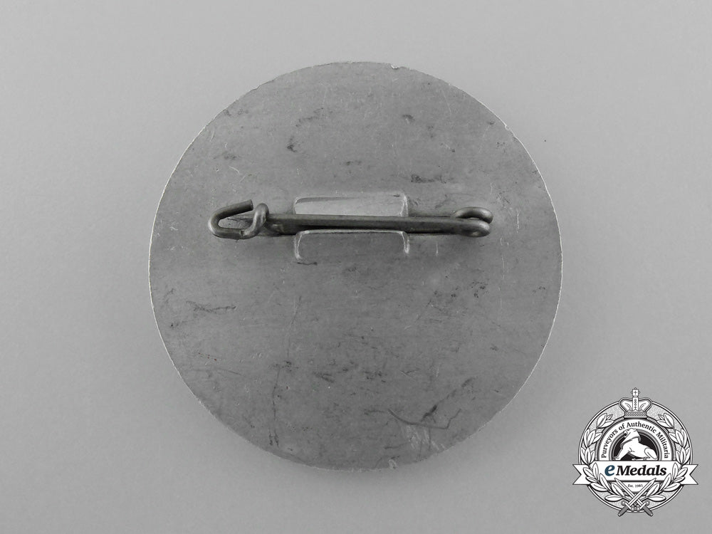 a1937_national_socialist_war_victim’s_care_berlin_veteran’s_meeting_badge_d_1061_1