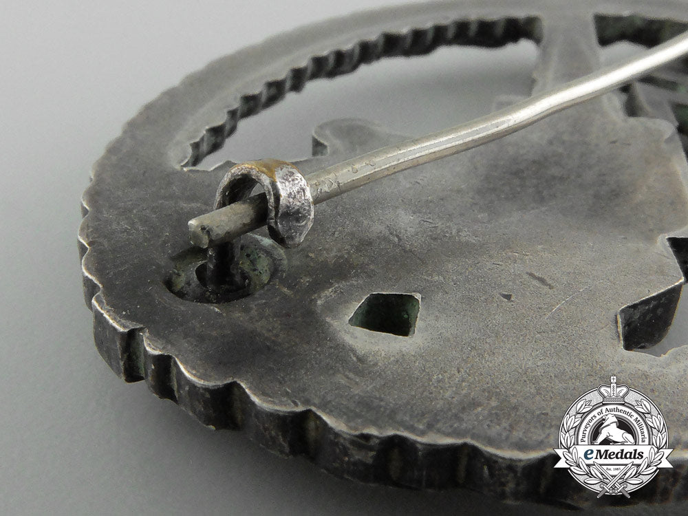 an_early_luftwaffe_flak_badge_in_tombac_with_ball_hinge_d_1289
