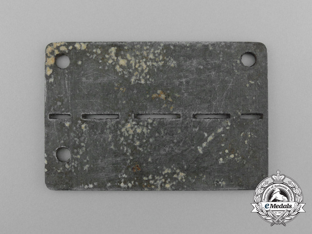 a_german_pow_camp_id_tag_for_allied_aviators_housed_at_the_stalag_viii-_b_camp_d_2163