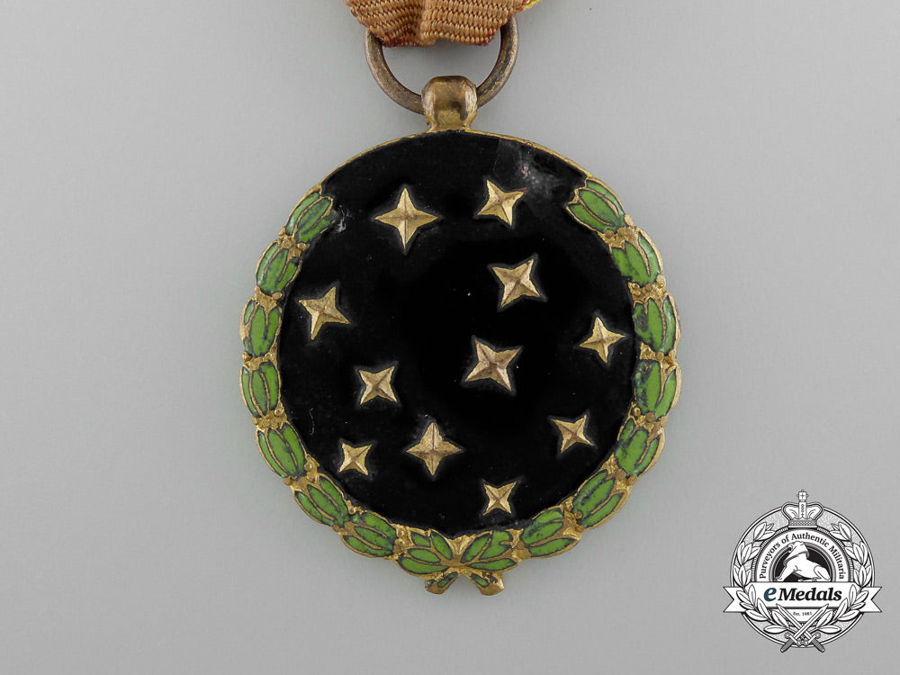 spain,_fascist_state._a_party_member's_medal;_named_d_2272