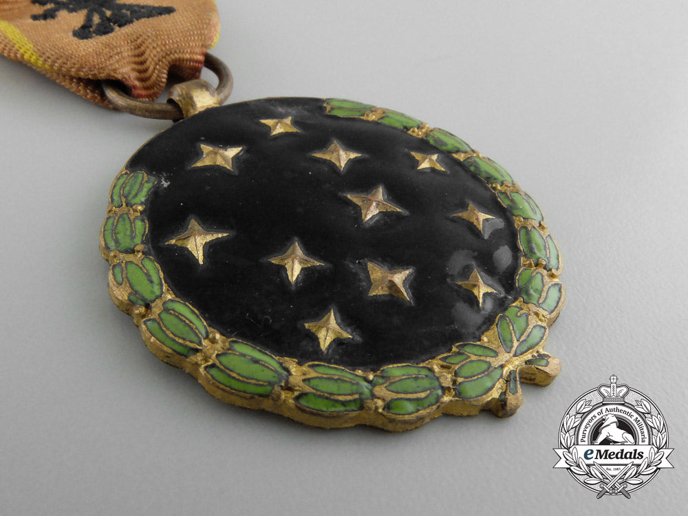 spain,_fascist_state._a_party_member's_medal;_named_d_2274