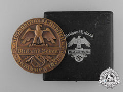 A Cased Blut Und Boden (Blood And Soil) Medal For Tobacco, Hamburg 1935