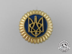 A Second War Ukrainian Auxiliary Police Cap Badge