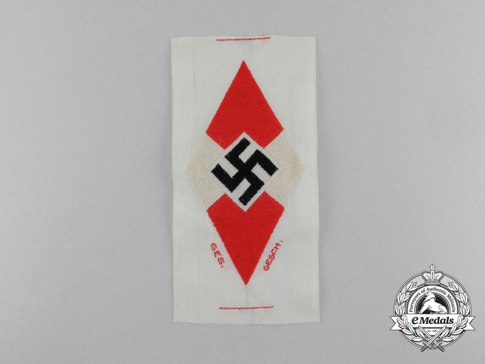 a_mint_and_unissued_hj_diamond_insignia_shirt_insignia;_hj_rzm_tagged_d_3160
