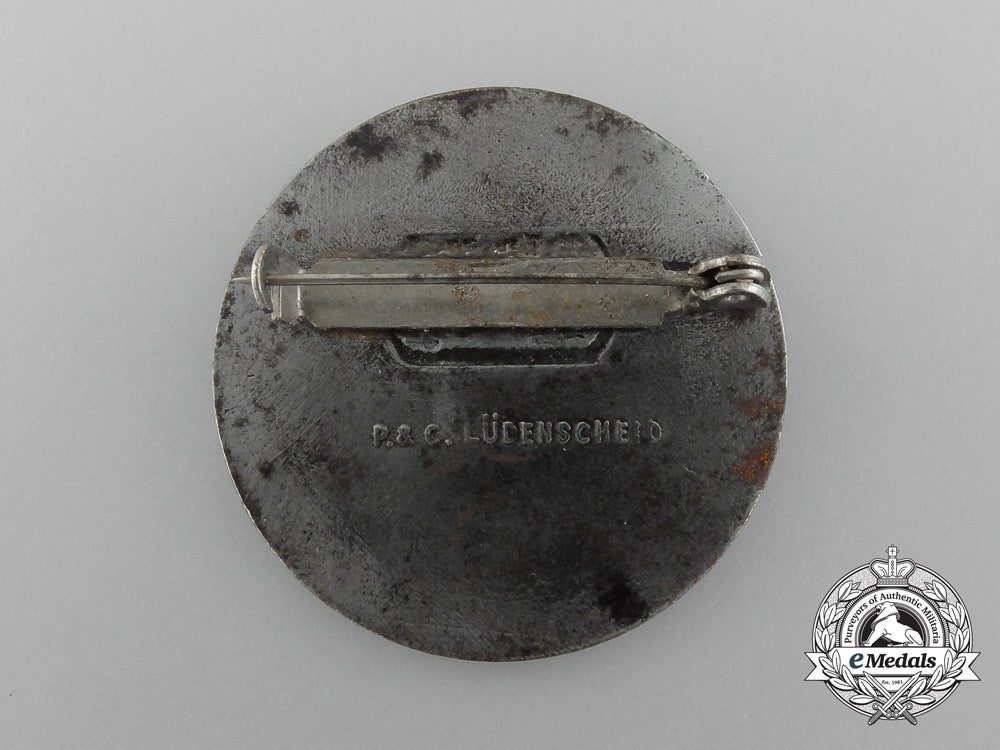 a1934_nsdap_reichs_party_day_badge_by_paulmann&_crone_d_4336