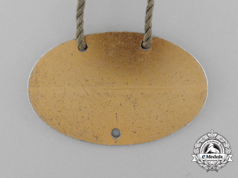 a_scarce_kriegsmarine_identification_tag_on_original_string_necklace_d_4417_1