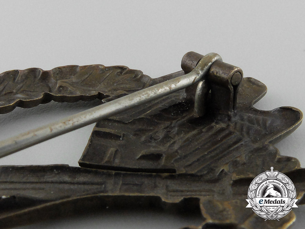 a_early_bronze_grade_infantry_assault_badge;_hollow_version_by_c._e._juncker_d_7004_1