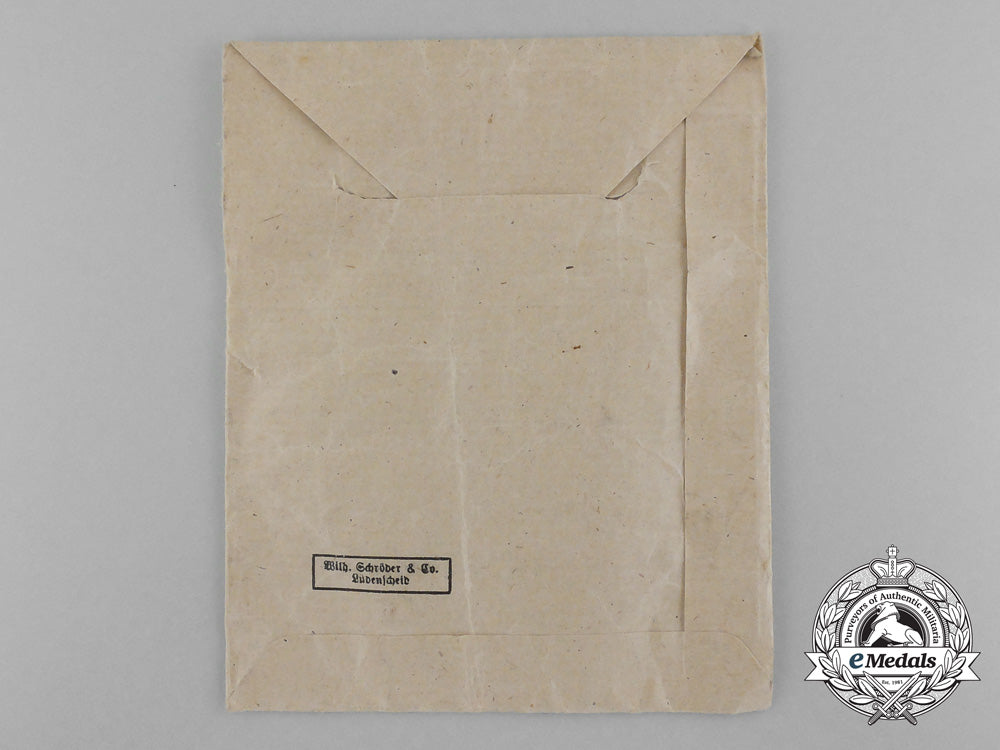 a_bronze_grade_mother’s_cross_with_original_packet_of_issue_by_wilhelm_schröder&_co._d_7843