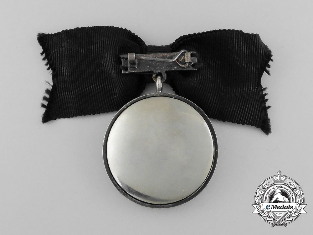 a_group_of_three_order_of_st._john_ladies'_badges_d_8379