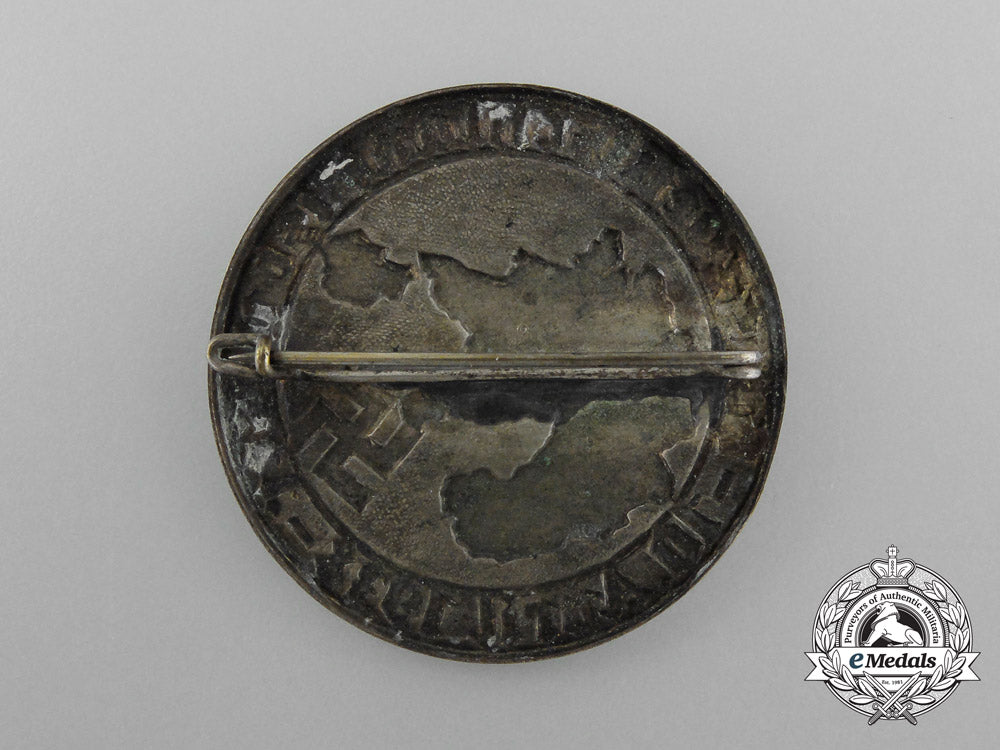 a1938“_greater_germany_is_ours”_celebration_badge_d_9839