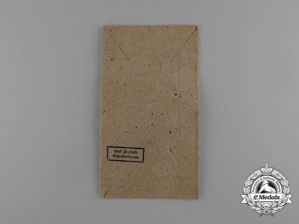 a_west_wall_medal_in_its_original_packet_of_issue_by_karl_poellath_of_schrobenhausen_d_9981_1