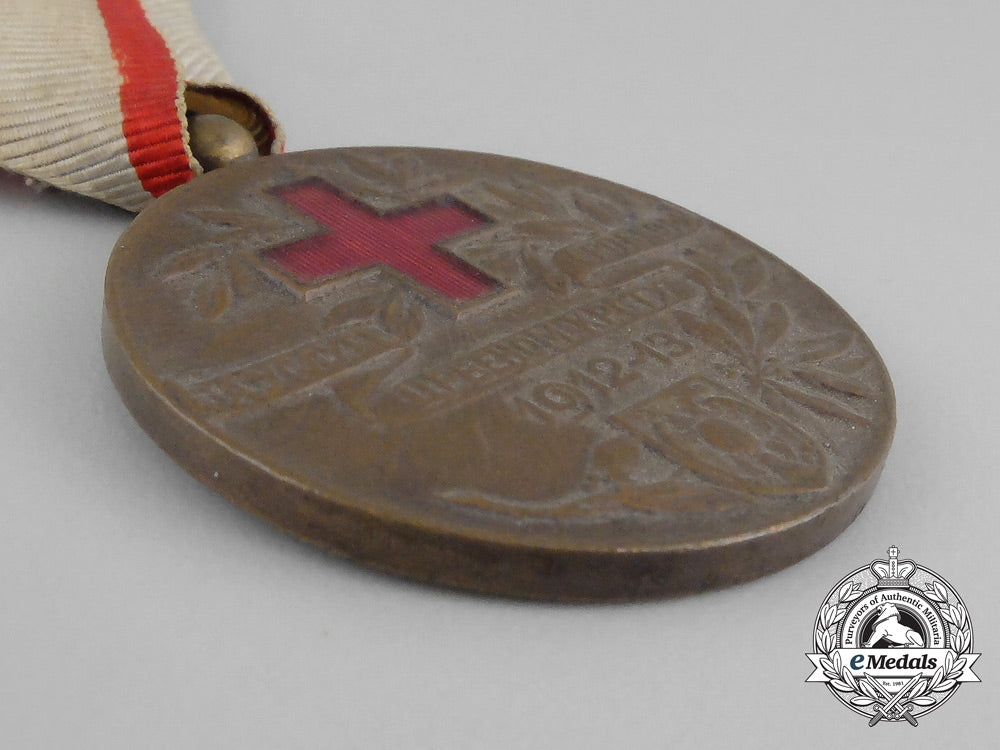 a_serbian_medal_of_the_red_cross_society;_type_i(1912-1921);_bronze_grade_dscf1178