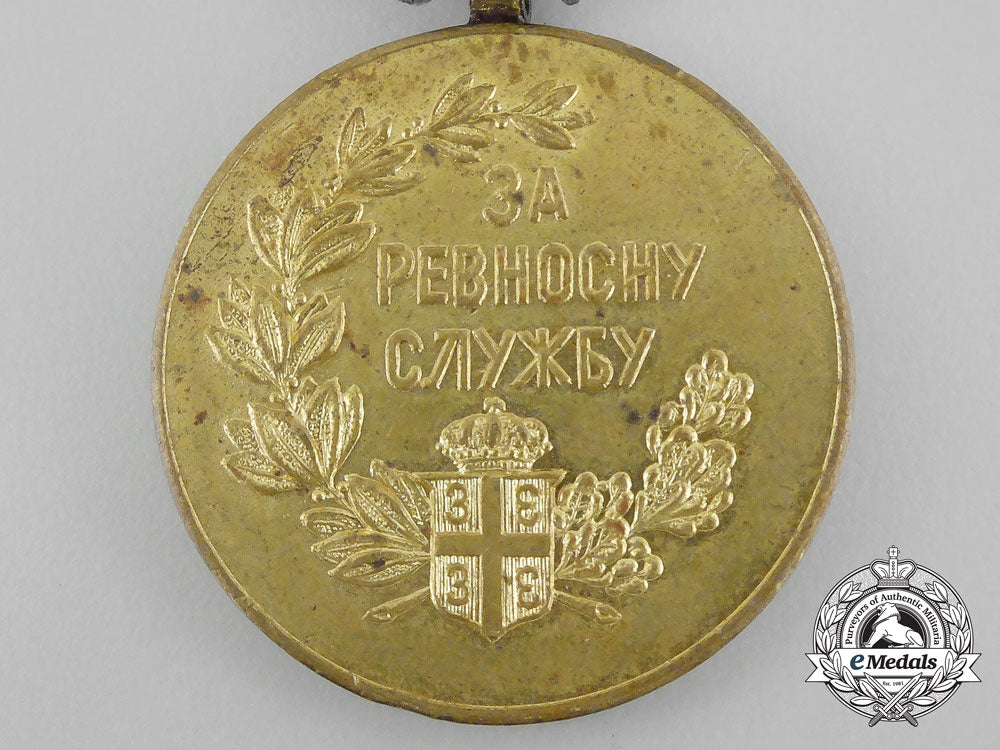 serbia,_kingdom._a_medal_for_zeal_with_one_crown_on_the_eagles,_bronze_grade_dscf1195
