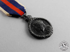 Four Coronation/Jubilee Miniature Medals