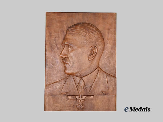germany,_third_reich._a_fine_hand-_carved_wooden_relief_of_a_h_e_medals__g63311_2
