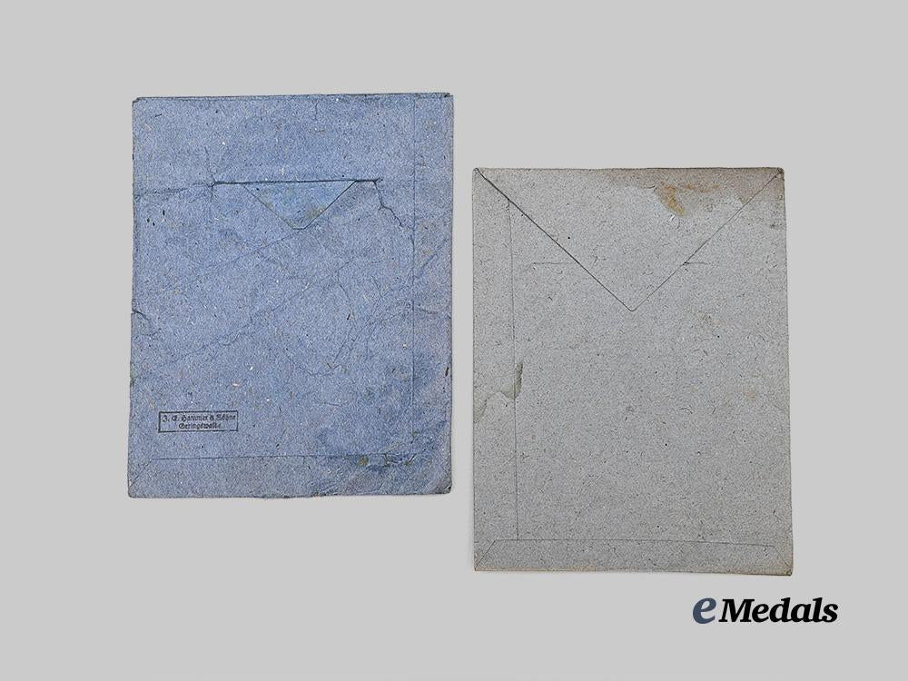 germany,_wehrmacht._a_pair_of_issue_packages_for_the1939_iron_cross_i_i_class_e_medals__g63371_4