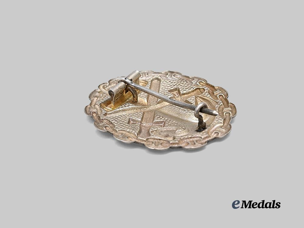 germany,_imperial._a_naval_wound_badge,_silver_grade,_privately-_purchased_example_in_silver_e_medals__g63427_4