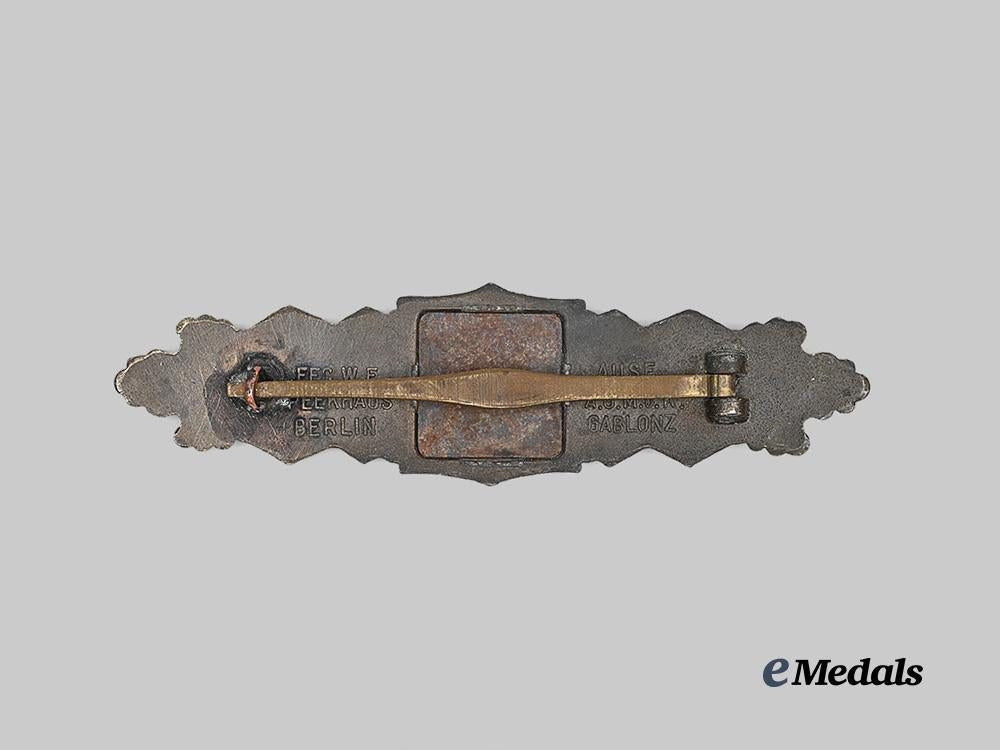 germany,_wehrmacht._a_close_combat_clasp,_bronze_grade,_large_font_variant_by_a._g._m.u._k._e_medals__g63582_3