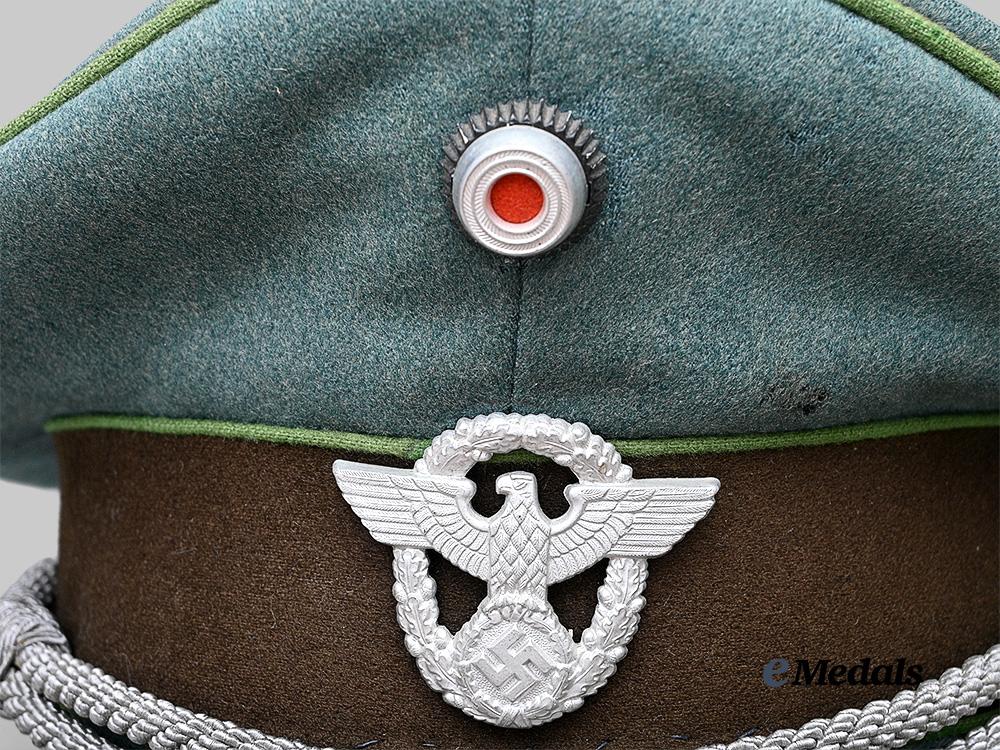 germany,_ordnungspolizei._a_schutzpolizei_visor_cap_for_officer_ranks_e_medals__g63653_10