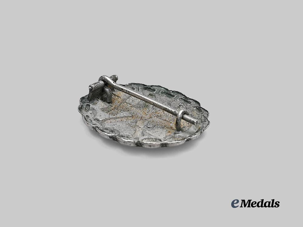 germany,_imperial._a_rare_naval_wound_badge,_silver_grade,_by_f._w._assmann&_söhne_e_medals__g63839_4