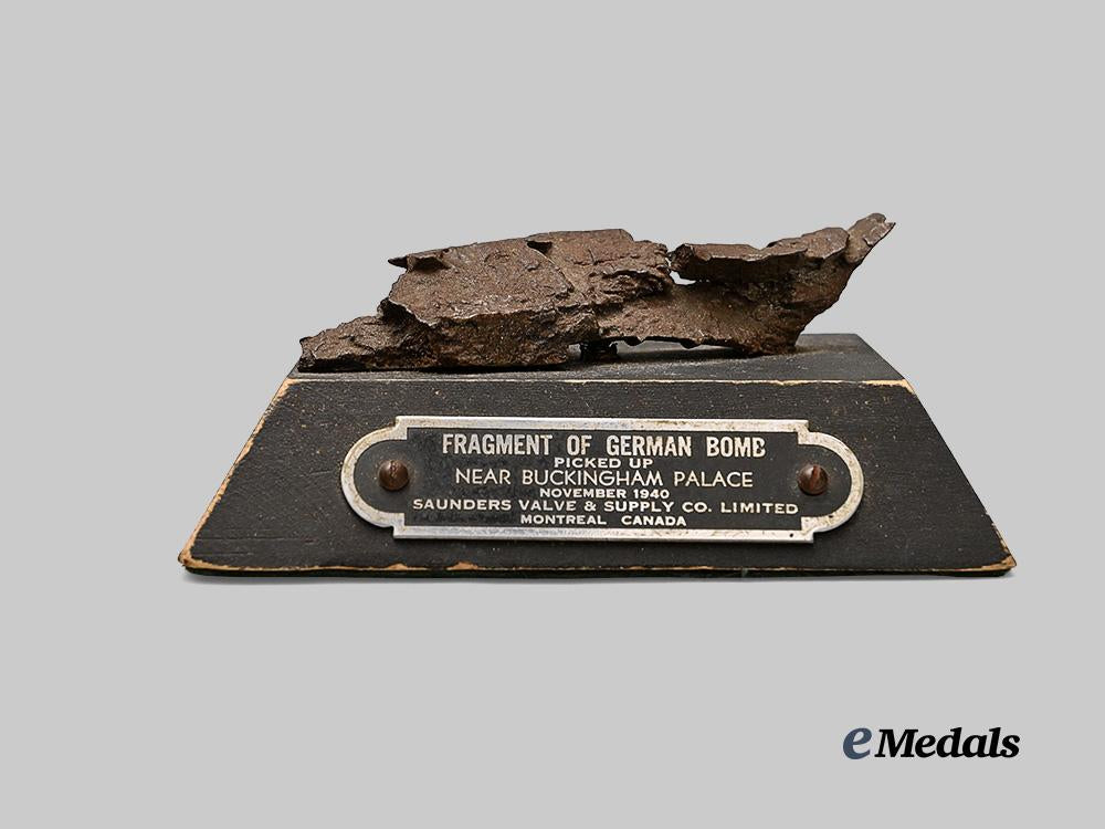 united_kingdom._a_german_bomb_fragment_on_plaque_e_medals__g_b8338_7