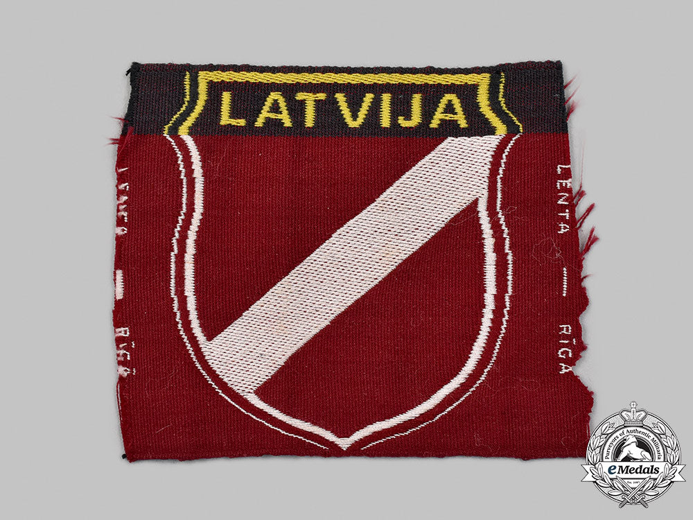 germany,_wehrmacht._a_latvian_volunteer’s_sleeve_shield,_by_lenta_46_m21_mnc1010