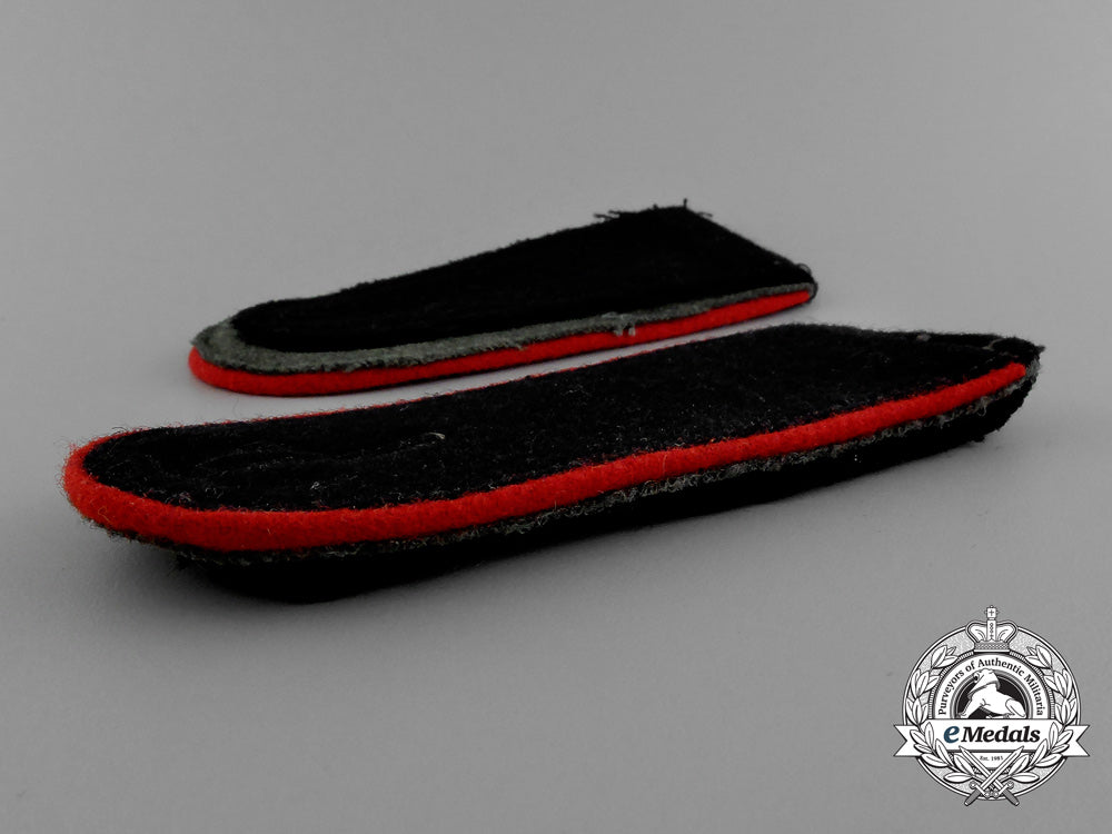 a_mint_matching_pair_of_waffen-_ss_artillery_enlisted_man’s_shoulder_straps_e_0140