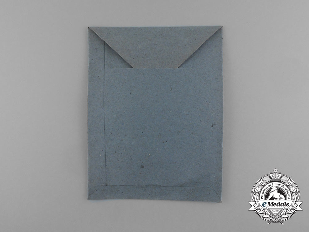 a_mint_iron_cross1939_second_class_by_scarce_maker_berg&_nolte_in_its_original_packet_of_issue_e_0487