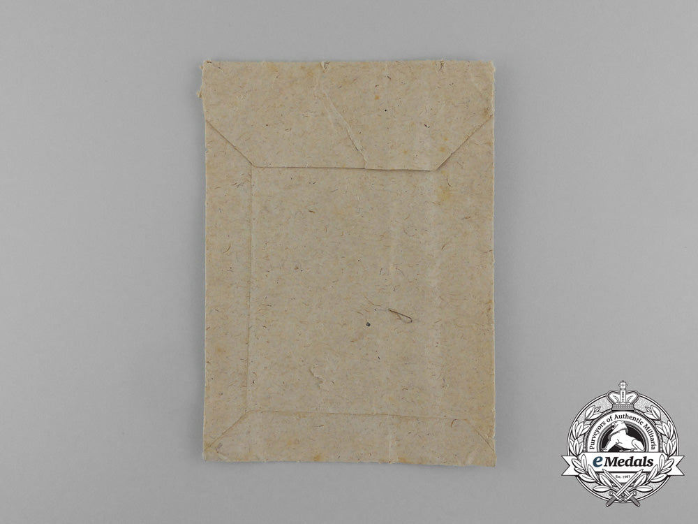 a_silver_grade_eastern_people_bravery_decoration;2_nd_class_in_its_original_packet_of_issue_e_1020