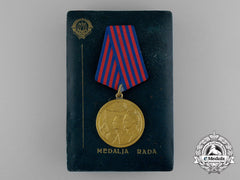 A Yugoslavian Medal Of Labour With Case