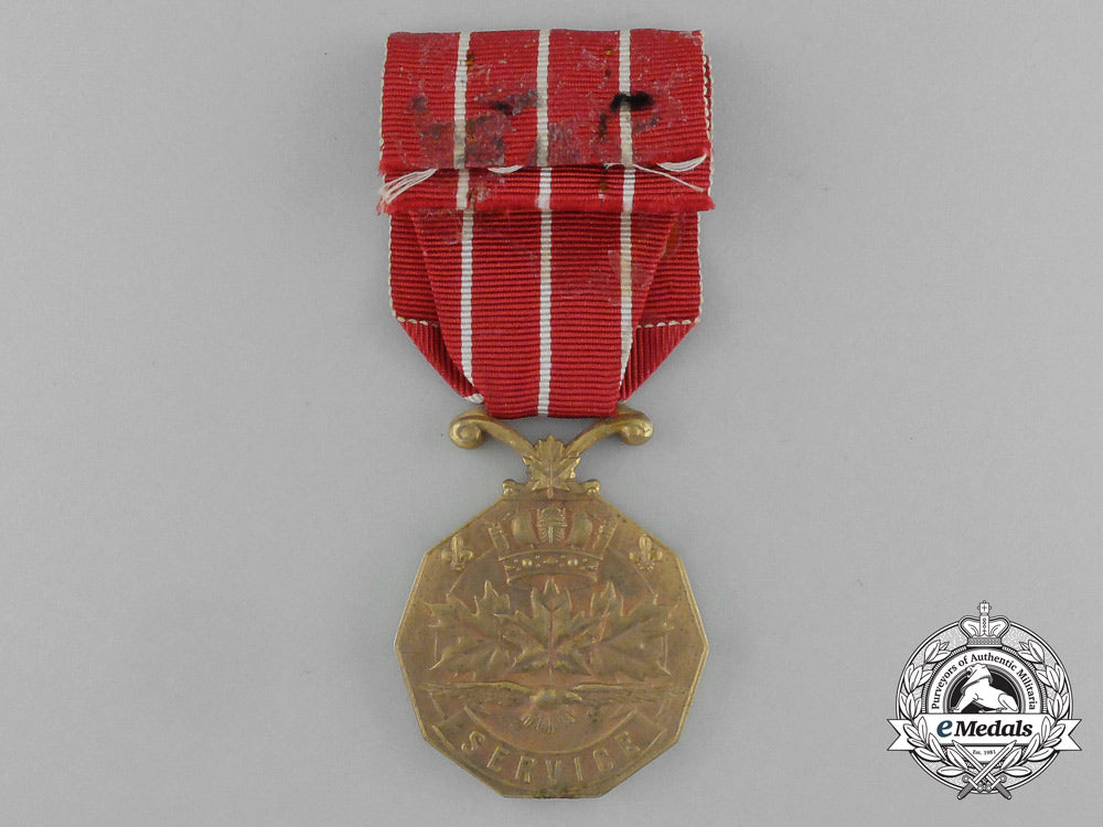 a_canadian_forces'_decoration_to_flight_lieutenant_a.d._speare;_rcaf_e_911_1