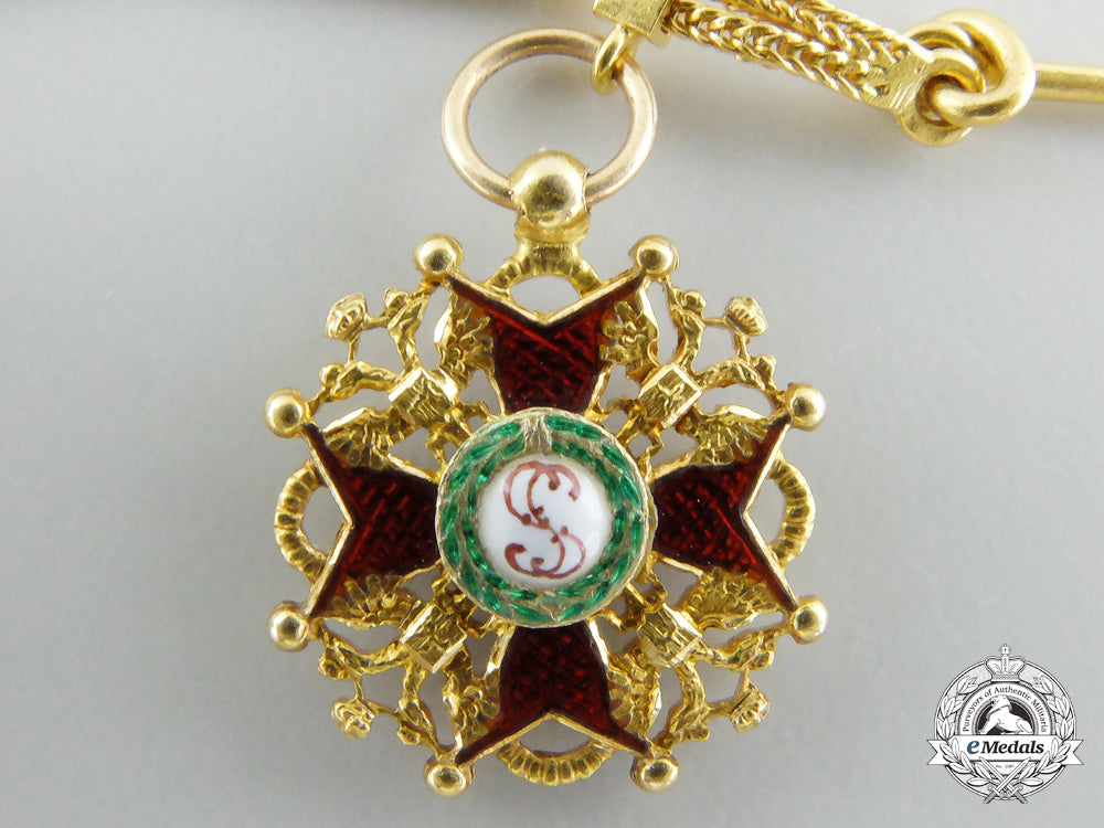 an_exquisite_miniature_grouping_in_gold_f_202