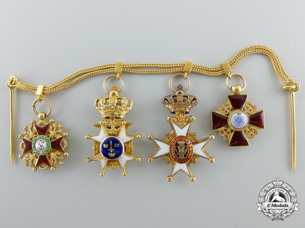 an_exquisite_miniature_grouping_in_gold_f_206
