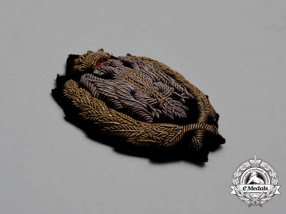 a_yugoslav_artillery_officer’s_visor_insignia;"_british"_cap_version_i_294_1