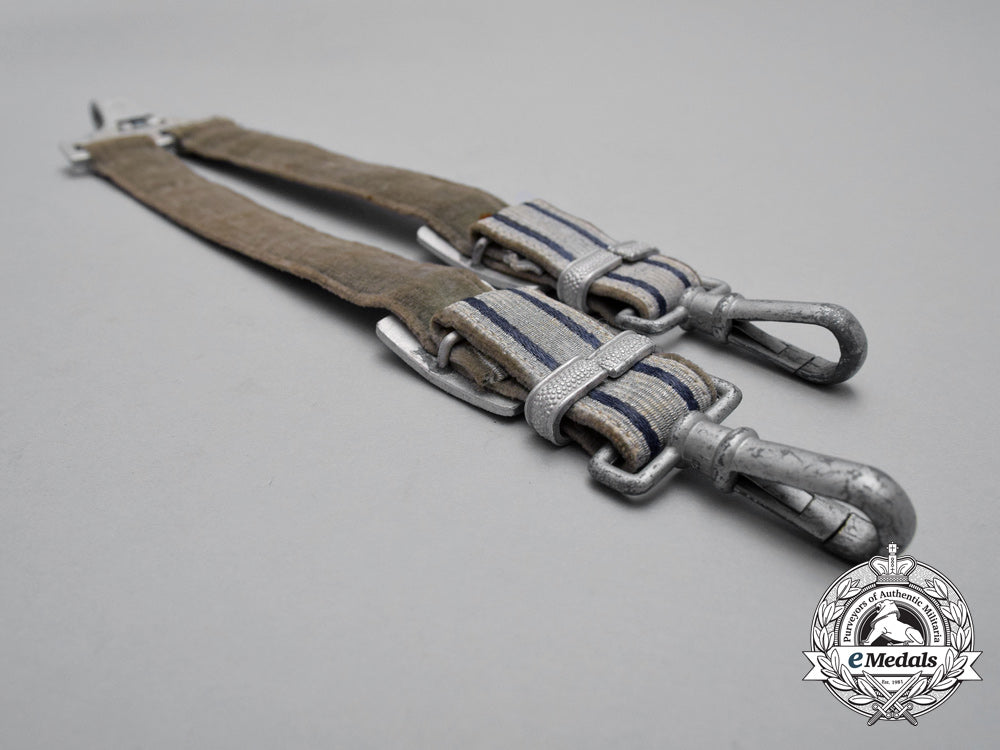 a_rare_set_of_social_welfare_leader’s_dagger_hangers_i_451_1
