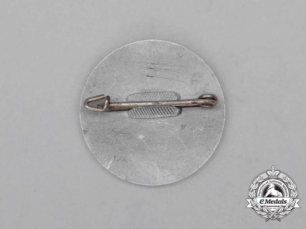 a1935/35_whw(_winter_relief_of_the_german_people)_donation_appreciation_badge_i_530_1