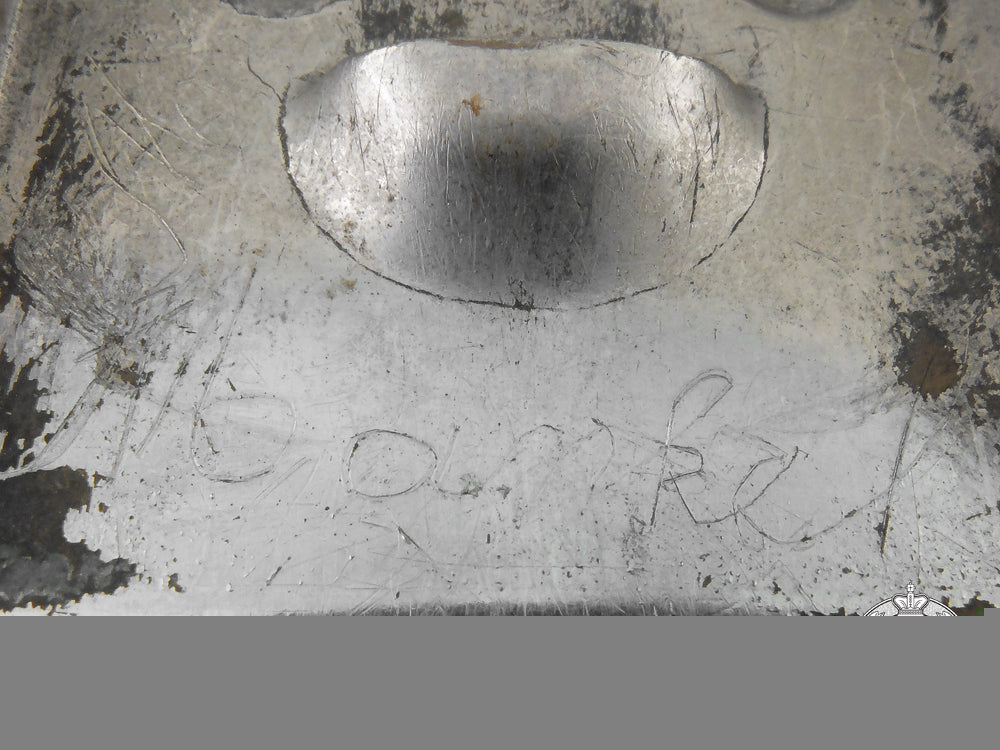 an_nskk_belt_buckle;_named_i_667