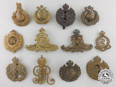 Twelve First & Second War British Cap Badges
