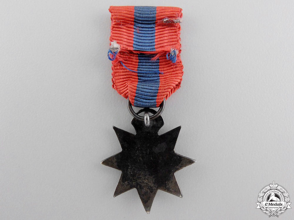united_kingdom._a_miniature_imperial_service_order_img_02.jpg5524174ddd212_1
