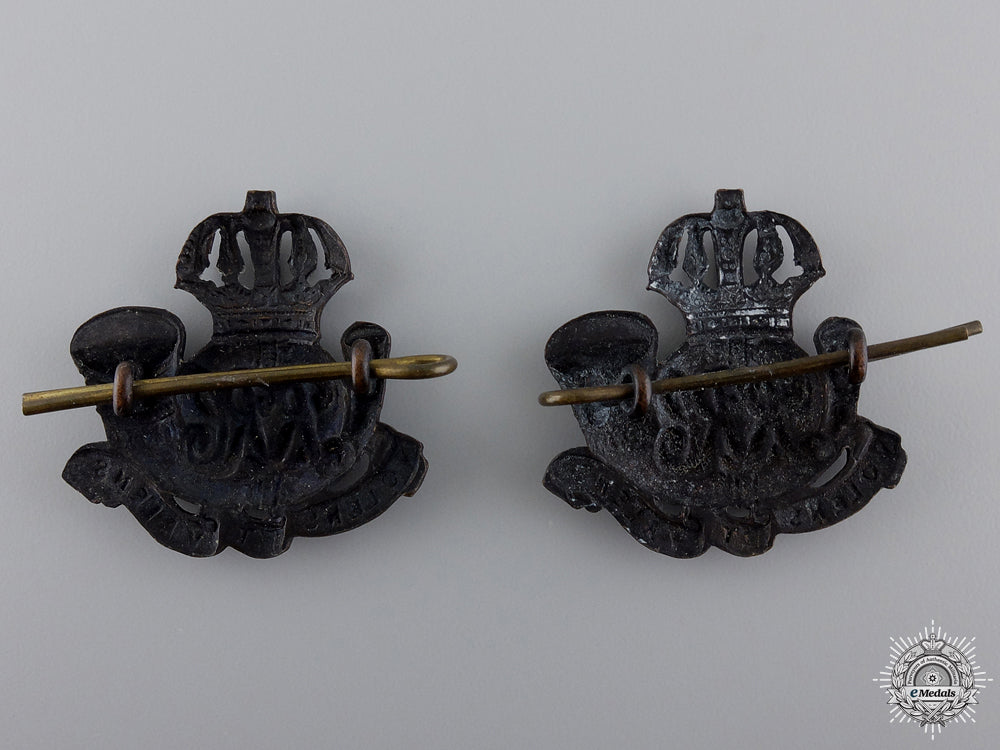 a_pair_of_inter-_war_royal_rifles_of_canada_collar_badges_img_02.jpg54c3df29b0ff7