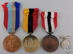 Four Nigerian Medals And Awards
