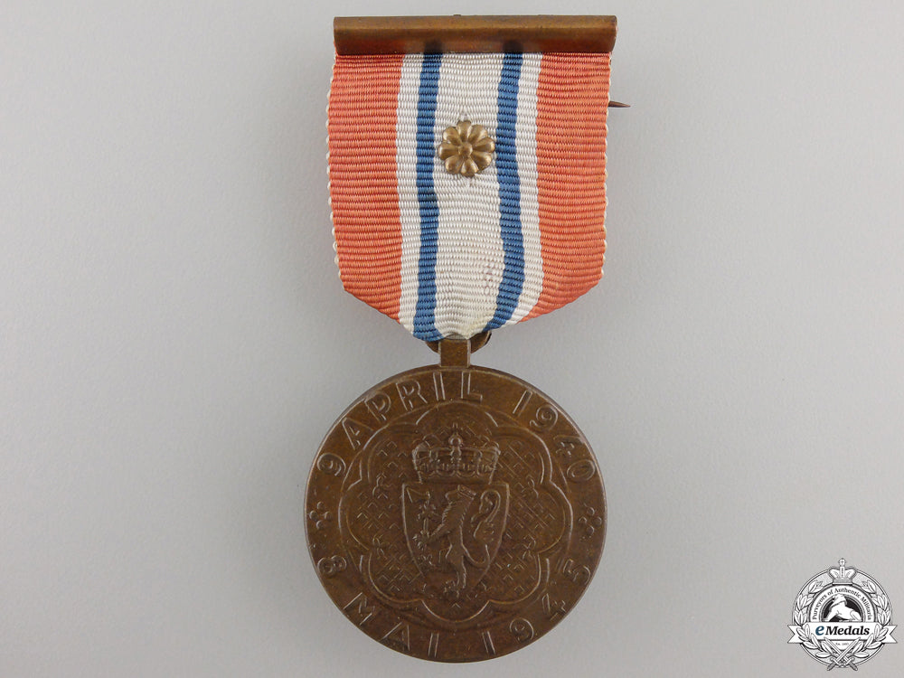 norway._a1940-45_war_medal_with_packet_img_02.jpg5575b0a4687de