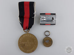 A German Oktober 1938 Medal With Ribbon Bar And Miniature
