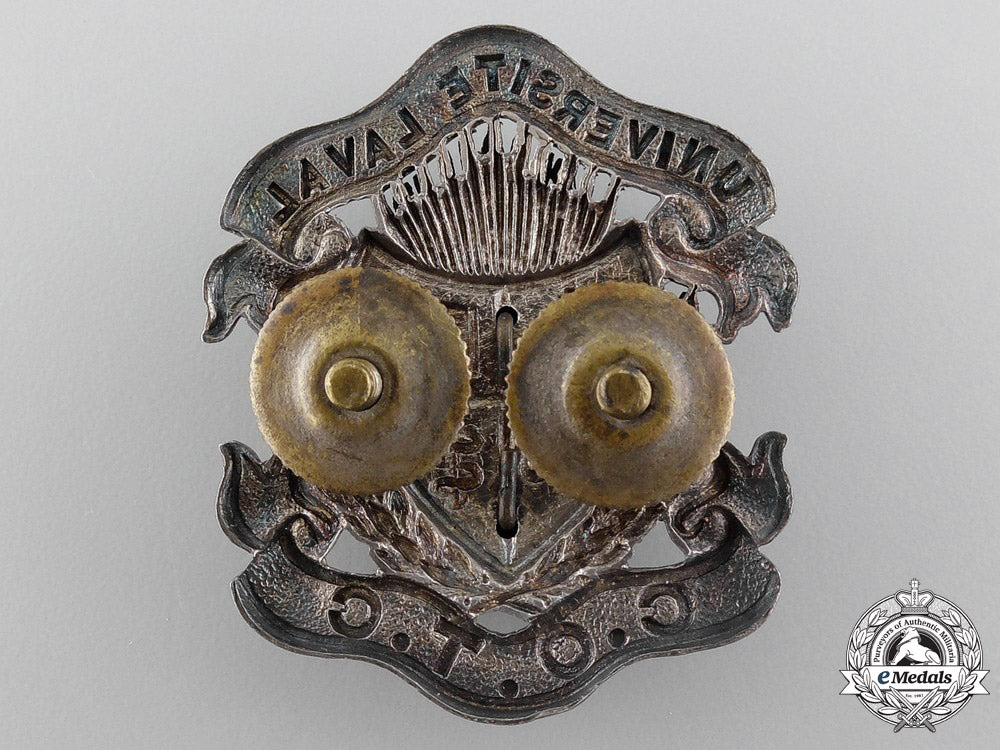 a_wwii_université_laval_canadian_officer_training_corps_cap_badge_img_02.jpg549496691a242_1