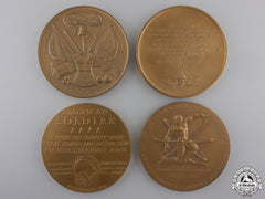 Four American Military Themed Table Medals