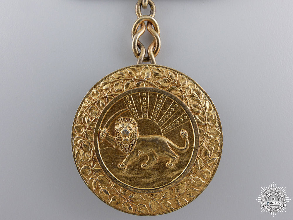 an_iranian_order_of_homayoun;_gold_grade_medal_img_02.jpg54e350ce95c9a
